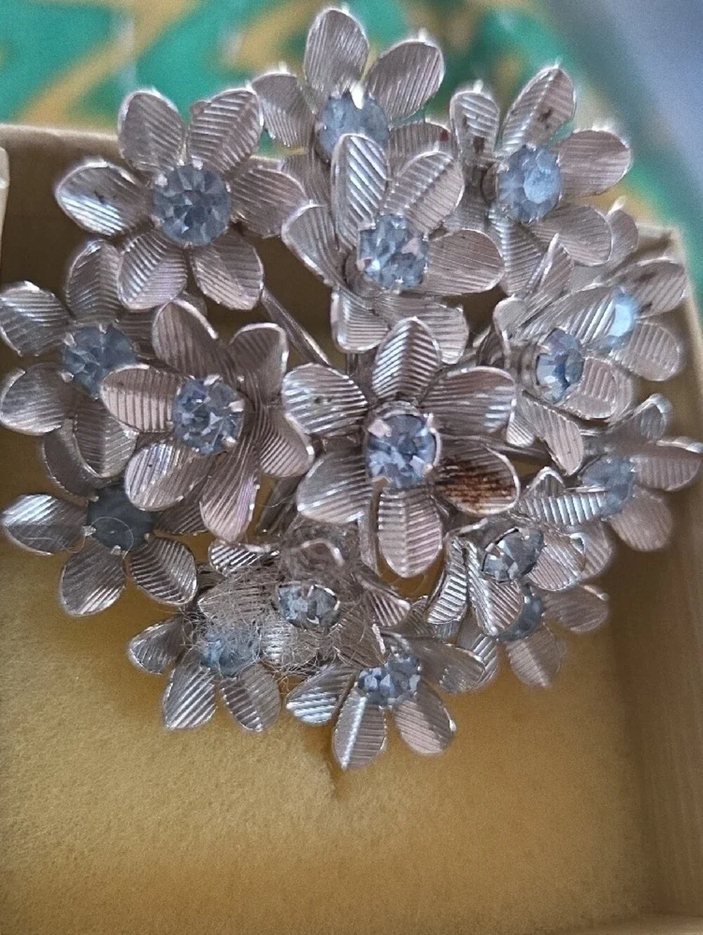 Vintage Coro Silver-Tone Floral Cluster Brooch with Blue Clear Stones